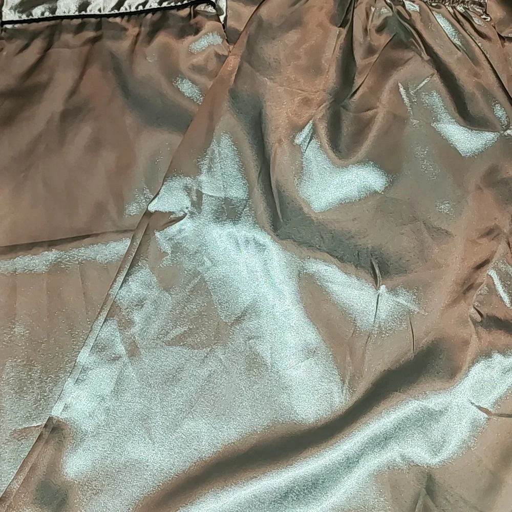 Green Luxe Nights Two Pieces Set Of Short Sleeved Top Plus Long Pants Pjs.